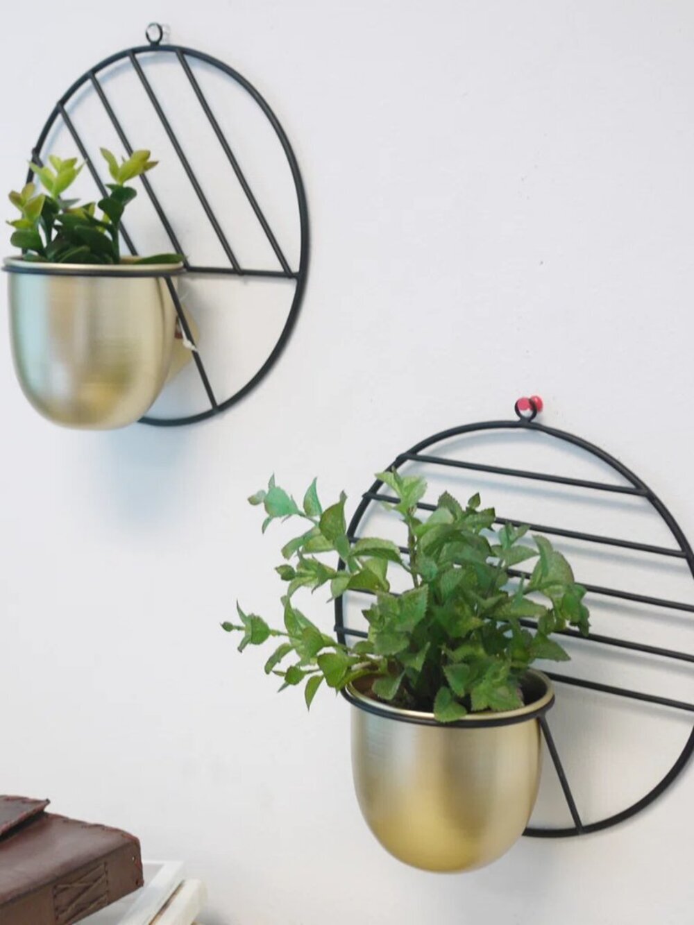 two modern gold and black small wall planters
